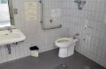 Toilet west of grass area inside Umekoji Park